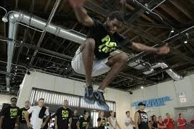 LiveLab production still — indoor parkour activation
